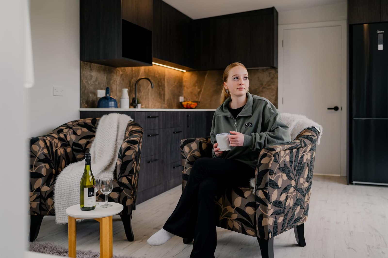 A client in the living area of her Paragon Portables home
