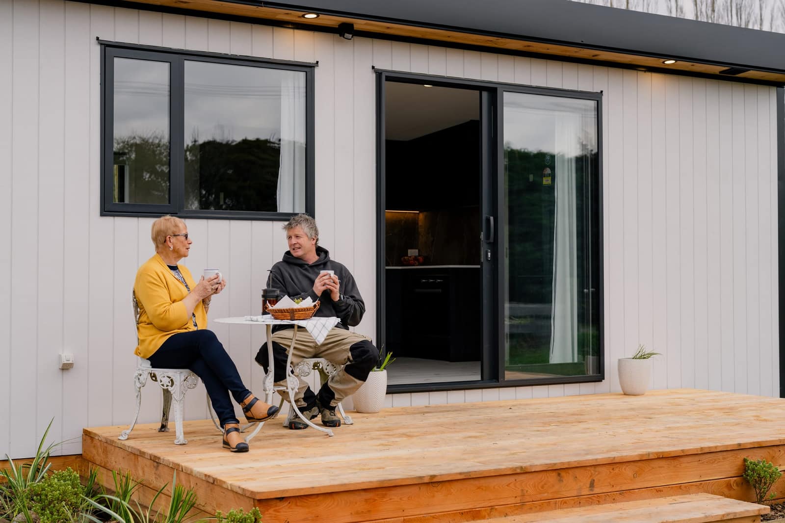 Clients on the deck of their finished Paragon Portables home