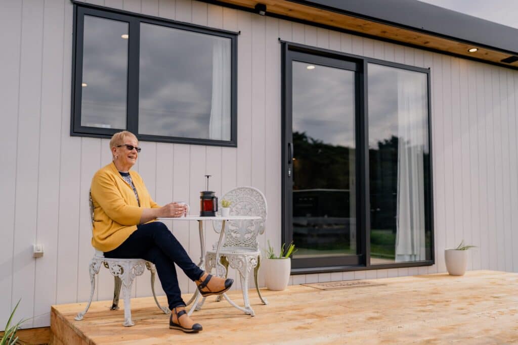 Morning coffee on the deck of a Paragon Portables home