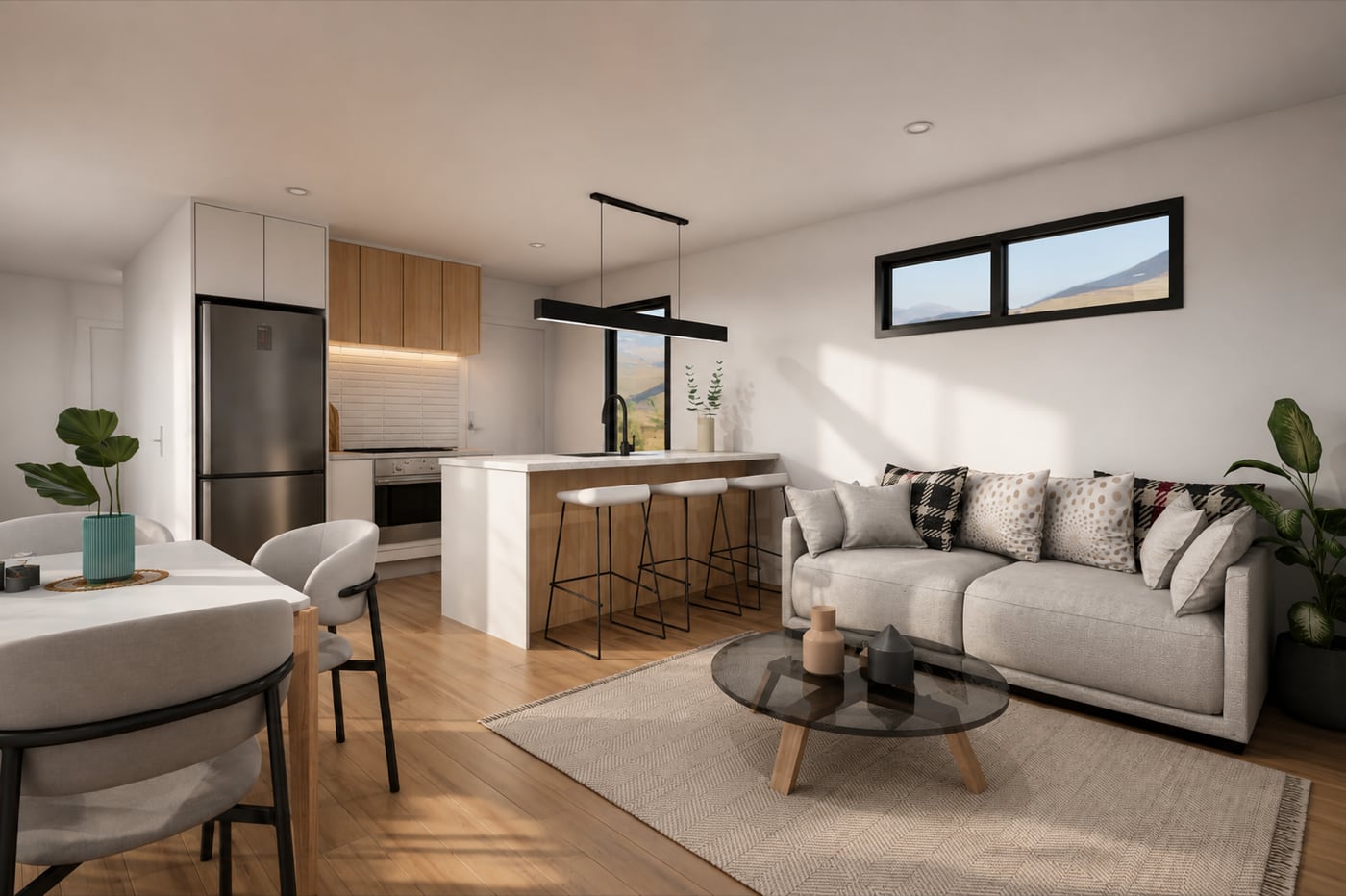 Open-plan living area inside a Paragon Portables two-bedroom portable home with modern kitchen, dining and lounge